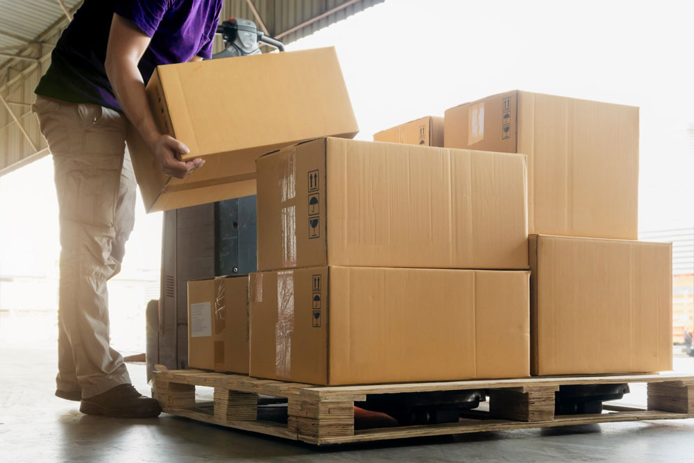 Worker,Courier,Lifting,Package,Boxes,Stacking,On,Pallet.,Supply,Chain. Courier Services